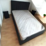 מיטה זוגית רגליים גבוהות צבע שחור מיטה וחצי